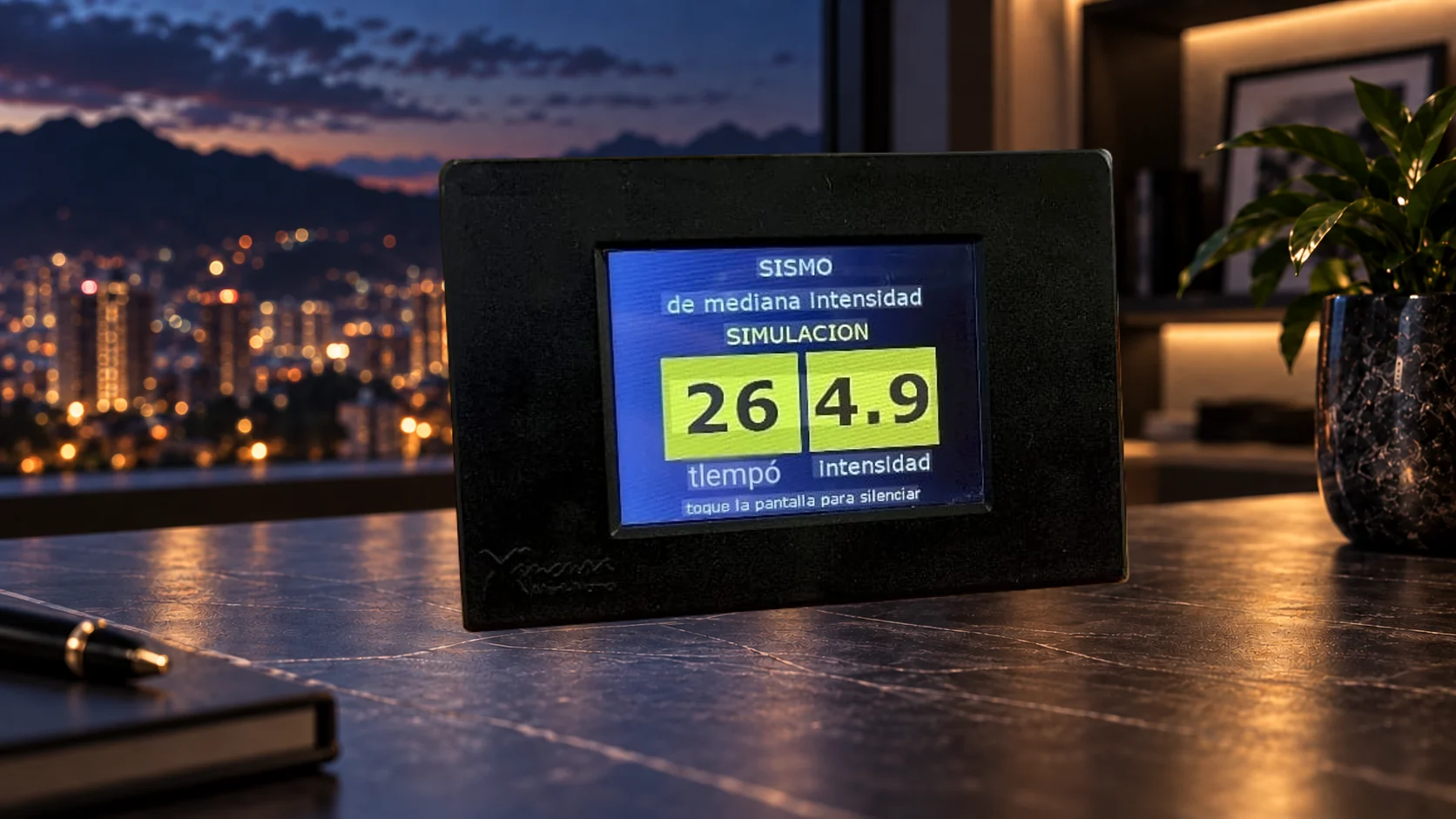 Alertnano de carcasa negra sobre un escritorio, con 26 en tiempo y 4.9 en intensidad en la pantalla de simulación